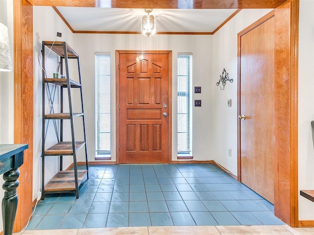 17612 Durbin Park Rd, Edmond, OK 73012 - tiled foyer featuring healthy amount of natural light, crown molding, and baseboards