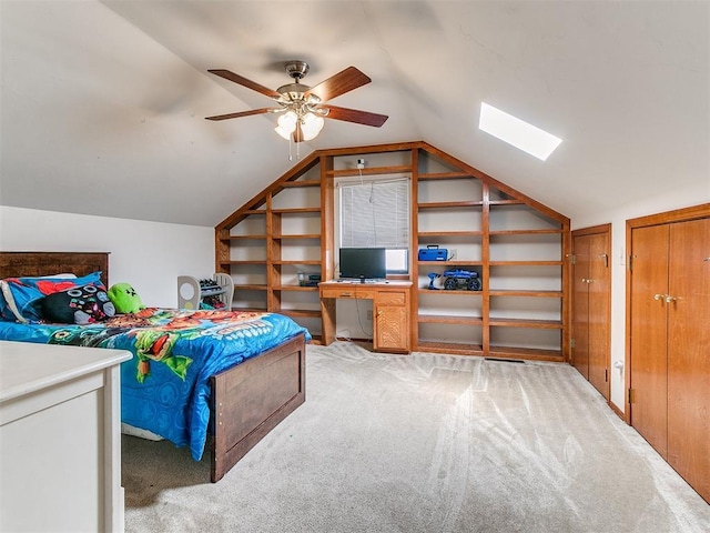 17612 Durbin Park Rd, Edmond, OK 73012 - carpeted bedroom with a skylight, lofted ceiling, and a ceiling fan