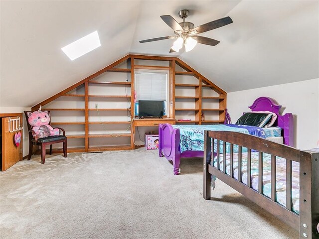 17612 Durbin Park Rd, Edmond, OK 73012 - bedroom featuring a skylight, vaulted ceiling, carpet flooring, and a ceiling fan