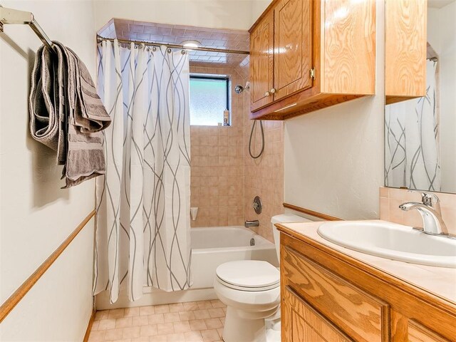 17612 Durbin Park Rd, Edmond, OK 73012 - full bath with vanity, shower / tub combo with curtain, toilet, and tile patterned floors