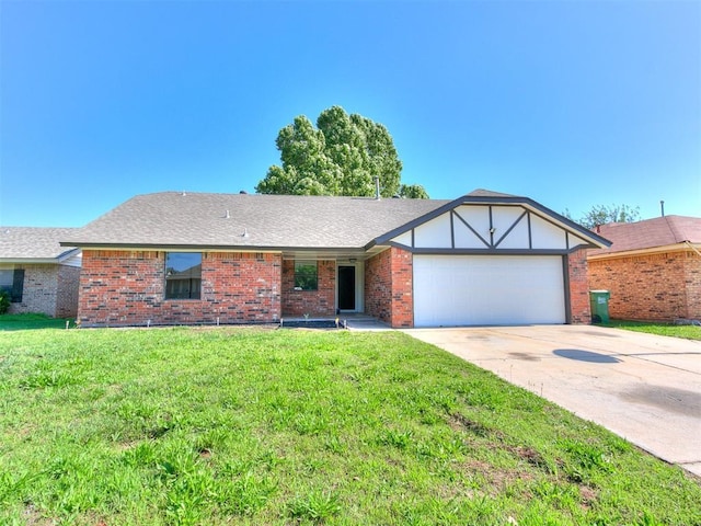 1033 Linn Ln, Yukon, OK 73099 - view of front facade with a garage, a front yard, concrete driveway, and brick siding