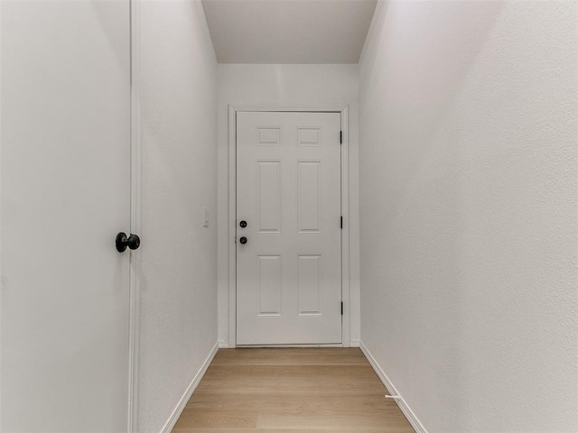 1033 Linn Ln, Yukon, OK 73099 - doorway to outside with light wood-style flooring and baseboards