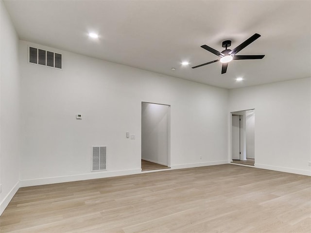 1033 Linn Ln, Yukon, OK 73099 - empty room with a ceiling fan, light wood-style floors, recessed lighting, and baseboards