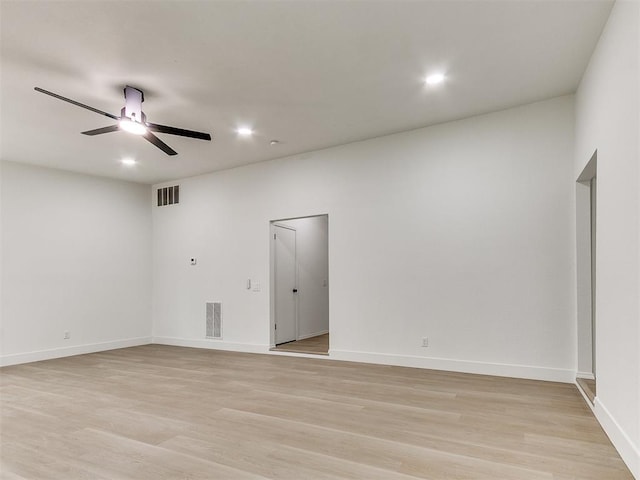 1033 Linn Ln, Yukon, OK 73099 - unfurnished room with light wood-style floors, a ceiling fan, baseboards, and recessed lighting