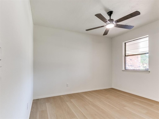1033 Linn Ln, Yukon, OK 73099 - unfurnished room with light wood-type flooring, ceiling fan, and baseboards
