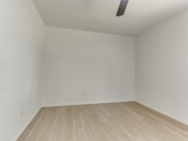 1033 Linn Ln, Yukon, OK 73099 - unfurnished room featuring light wood finished floors, a ceiling fan, and baseboards