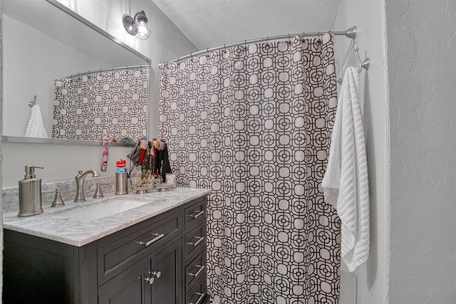 1301 Canterbury Blvd, Altus, OK 73521 - bathroom featuring vanity and a shower with shower curtain