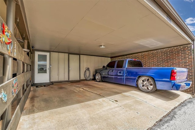 1301 Canterbury Blvd, Altus, OK 73521 - garage featuring a carport