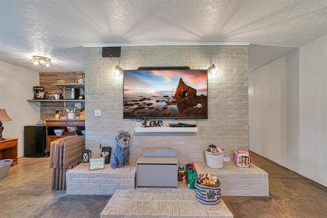 1301 Canterbury Blvd, Altus, OK 73521 - living room featuring a textured ceiling and concrete flooring