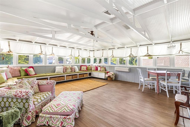 516 S Macomb Ave, El Reno, OK 73036 - sunroom / solarium with wood finished floors, a wall unit AC, and a deck
