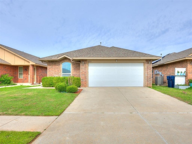5805 Marblewood Dr, Oklahoma City, OK 73179 - ranch-style house with an attached garage, brick siding, driveway, and a front yard