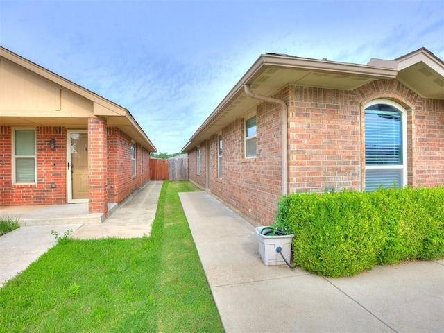 5805 Marblewood Dr, Oklahoma City, OK 73179 - view of side of property featuring brick siding