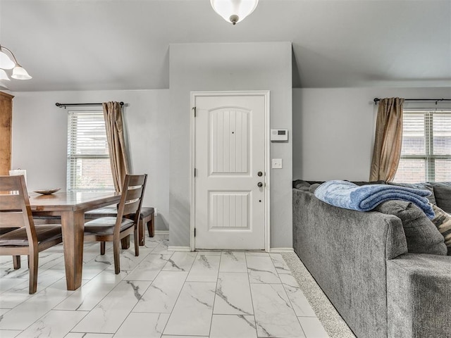 5805 Marblewood Dr, Oklahoma City, OK 73179 - entryway featuring light marble finish flooring and healthy amount of natural light