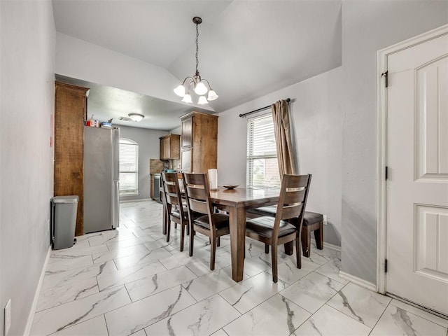 5805 Marblewood Dr, Oklahoma City, OK 73179 - dining room with a chandelier, light marble finish flooring, lofted ceiling, and healthy amount of natural light