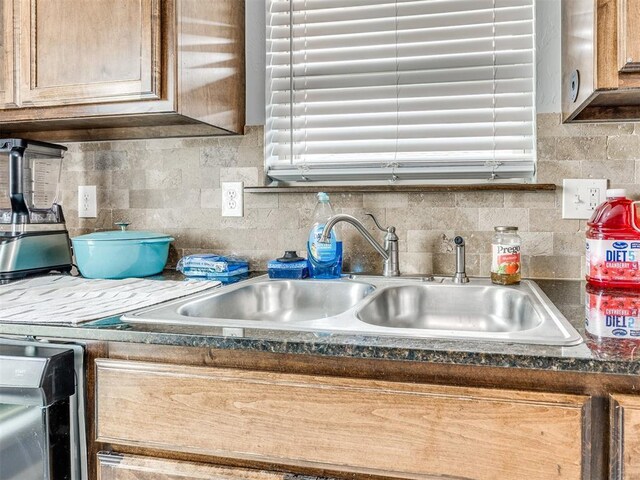 5805 Marblewood Dr, Oklahoma City, OK 73179 - kitchen view of backsplash and dark countertops