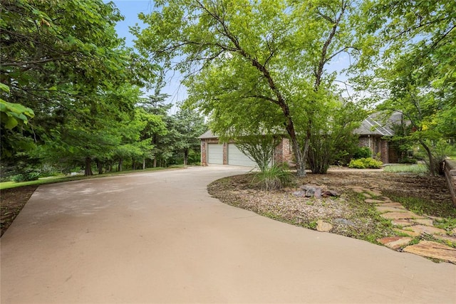 6373 Stone Valley Dr, Edmond, OK 73034 - view of front of house with a garage