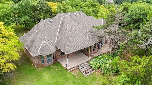 6373 Stone Valley Dr, Edmond, OK 73034 - aerial view of property and surrounding area featuring a forest