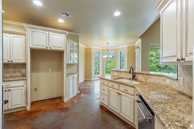 6373 Stone Valley Dr, Edmond, OK 73034 - kitchen featuring a sink, stainless steel dishwasher, a peninsula, decorative backsplash, and light stone counters