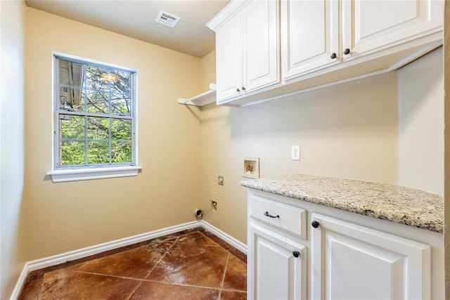 6373 Stone Valley Dr, Edmond, OK 73034 - laundry room featuring baseboards, cabinet space, hookup for an electric dryer, and hookup for a washing machine