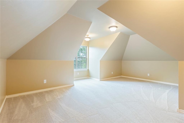 6373 Stone Valley Dr, Edmond, OK 73034 - bonus room with carpet, baseboards, and vaulted ceiling