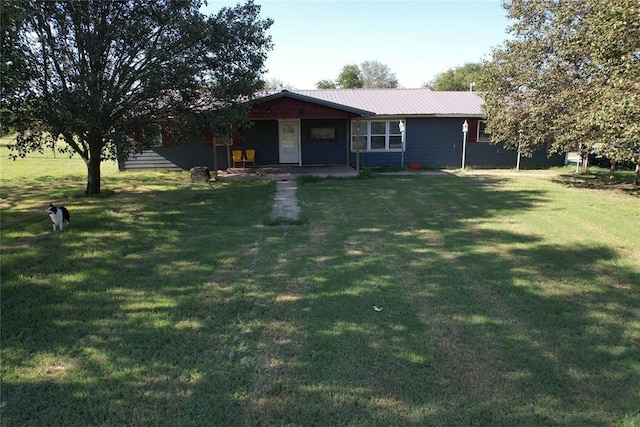 513 E Monroe St, Maud, OK 74854 - single story home featuring a front yard and metal roof