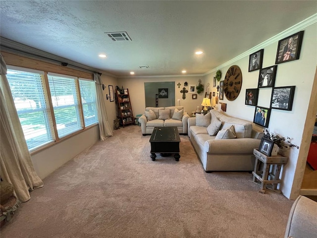513 E Monroe St, Maud, OK 74854 - living area featuring light carpet, ornamental molding, and recessed lighting
