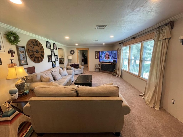 513 E Monroe St, Maud, OK 74854 - living room with light colored carpet, ornamental molding, and recessed lighting