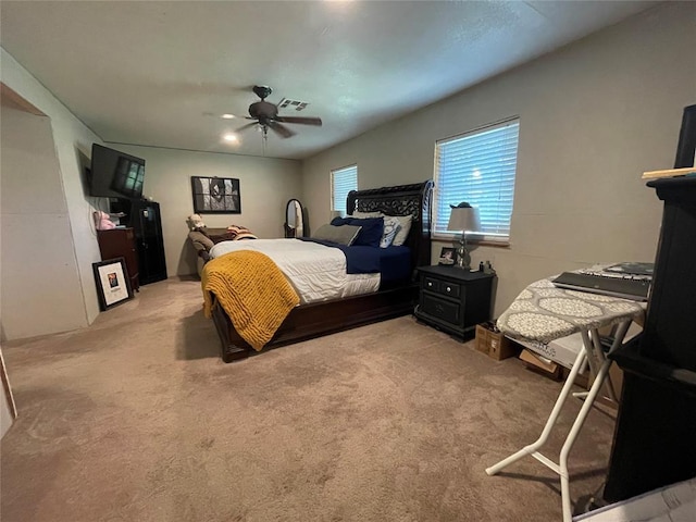 513 E Monroe St, Maud, OK 74854 - bedroom featuring light colored carpet and a ceiling fan