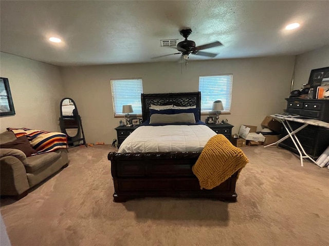 513 E Monroe St, Maud, OK 74854 - bedroom with carpet flooring, multiple windows, a ceiling fan, and recessed lighting