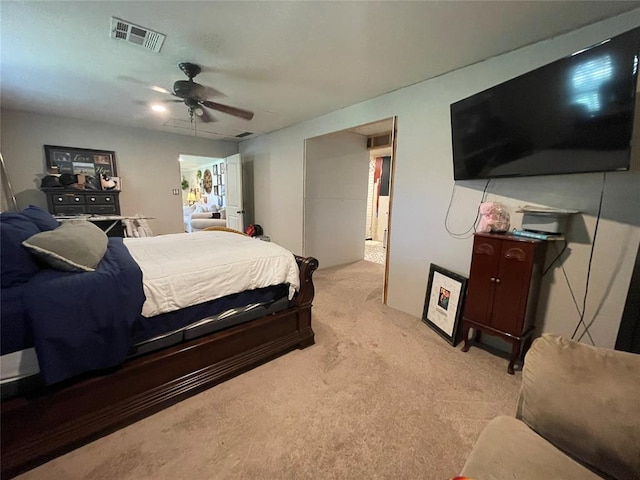 513 E Monroe St, Maud, OK 74854 - bedroom featuring light carpet and ceiling fan