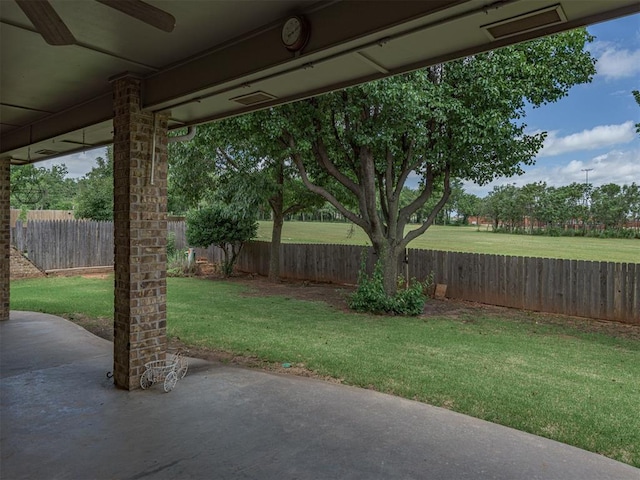 421 Meadow Run Ct, Yukon, OK 73099 - view of yard featuring a patio and a ceiling fan