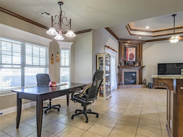 421 Meadow Run Ct, Yukon, OK 73099 - home office featuring plenty of natural light, ornamental molding, a tiled fireplace, baseboards, and light tile patterned floors