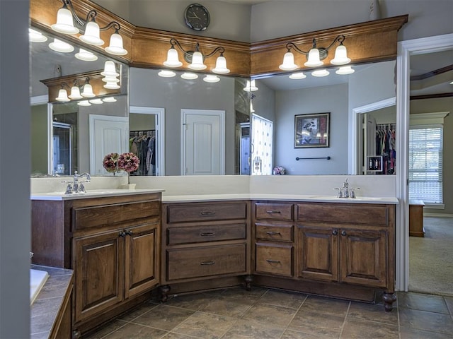 421 Meadow Run Ct, Yukon, OK 73099 - full bath featuring double vanity, a walk in closet, and a shower with door