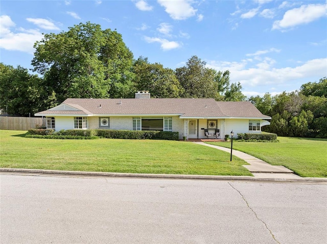 1616 SW 6th Ave, Ardmore, OK 73401 - ranch-style house with a chimney