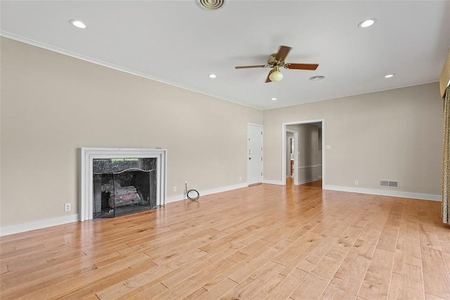 1616 SW 6th Ave, Ardmore, OK 73401 - unfurnished living room featuring ceiling fan, crown molding, light wood-type flooring, recessed lighting, and baseboards