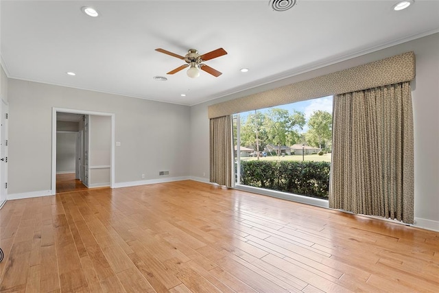 1616 SW 6th Ave, Ardmore, OK 73401 - spare room with ceiling fan, crown molding, light wood-style flooring, baseboards, and recessed lighting