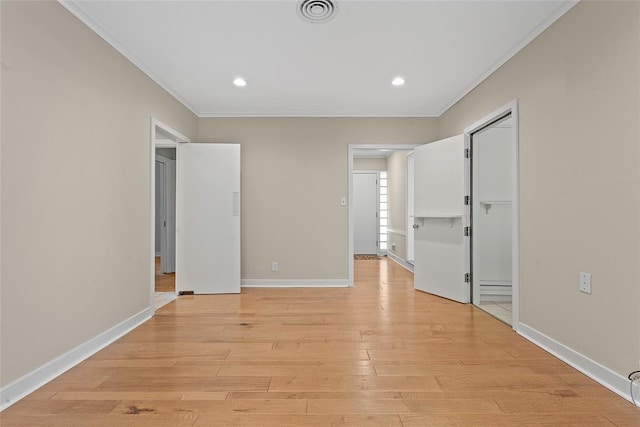 1616 SW 6th Ave, Ardmore, OK 73401 - unfurnished bedroom featuring ornamental molding, light wood finished floors, baseboards, recessed lighting, and a closet