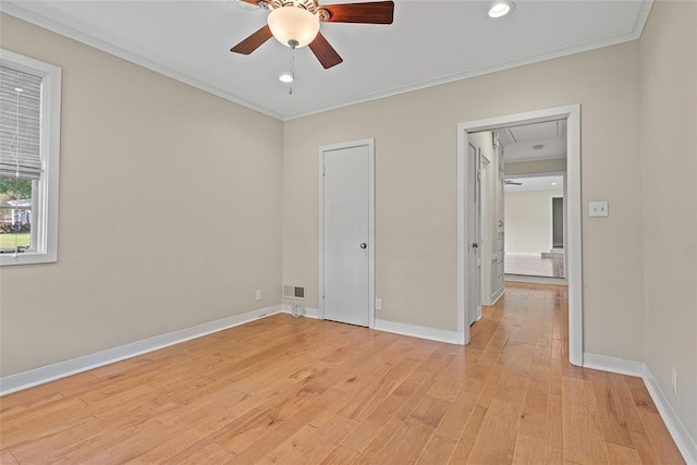 1616 SW 6th Ave, Ardmore, OK 73401 - unfurnished bedroom with light wood-style floors, crown molding, attic access, and baseboards