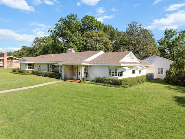 1616 SW 6th Ave, Ardmore, OK 73401 - ranch-style house with a front lawn and a chimney