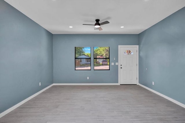 1435 NE 27th St, Oklahoma City, OK 73111 - spare room with a ceiling fan, wood finished floors, baseboards, and recessed lighting