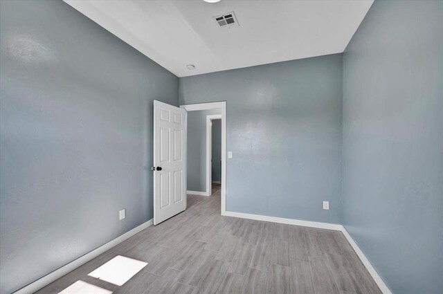 1435 NE 27th St, Oklahoma City, OK 73111 - unfurnished room featuring baseboards and wood finished floors
