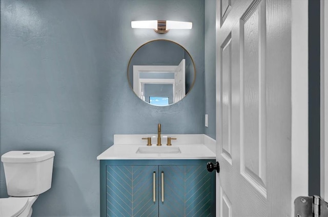 1435 NE 27th St, Oklahoma City, OK 73111 - half bathroom featuring toilet and vanity