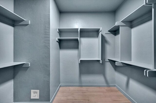 1435 NE 27th St, Oklahoma City, OK 73111 - spacious closet with wood finished floors