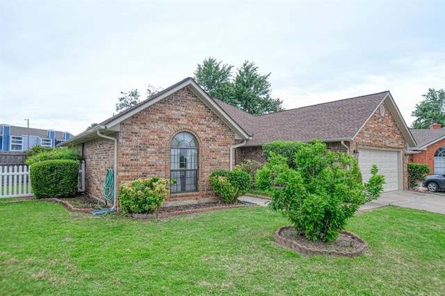 3100 Windward Ct, Norman, OK 73072 - ranch-style house with brick siding, a garage, and concrete driveway