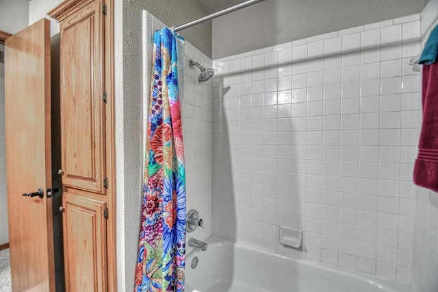 3100 Windward Ct, Norman, OK 73072 - bathroom with a textured wall and shower / bath combo with shower curtain