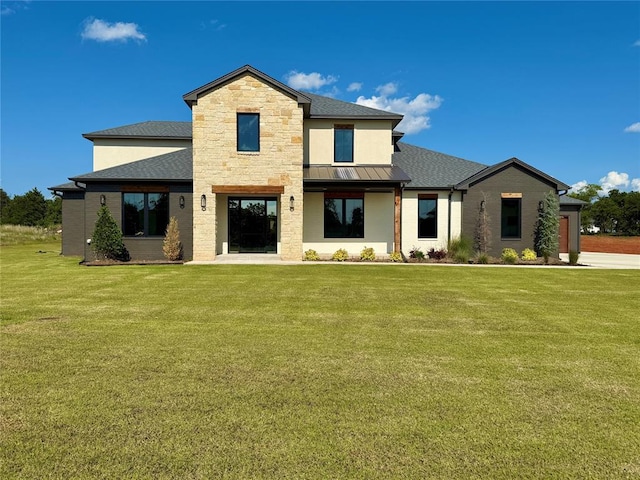 3320 Somerset Farms Rd, Newalla, OK 74857 - view of front of house with a front yard, a standing seam roof, an attached garage, a shingled roof, and metal roof