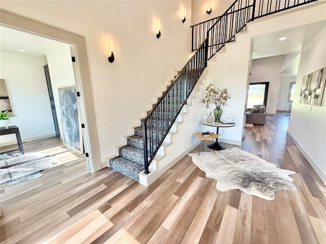3320 Somerset Farms Rd, Newalla, OK 74857 - stairway with wood finished floors and baseboards