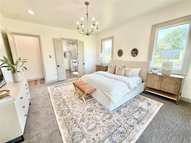 3320 Somerset Farms Rd, Newalla, OK 74857 - carpeted bedroom with a chandelier and baseboards