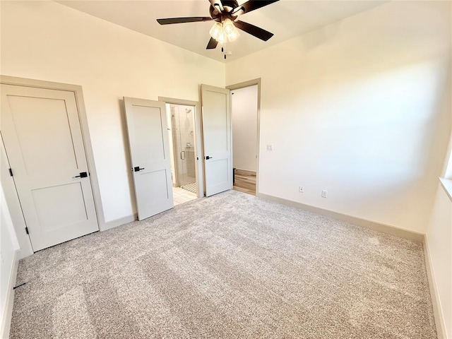 3320 Somerset Farms Rd, Newalla, OK 74857 - unfurnished bedroom featuring light carpet, baseboards, connected bathroom, and a ceiling fan
