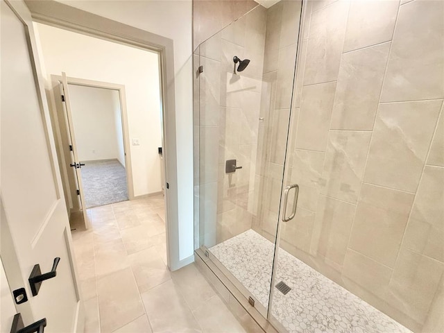 3320 Somerset Farms Rd, Newalla, OK 74857 - full bath with a shower stall, tile patterned floors, and baseboards